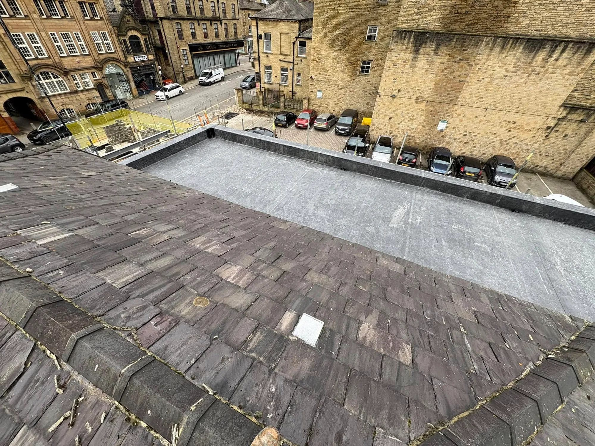 Flat roof with new membrane being installed